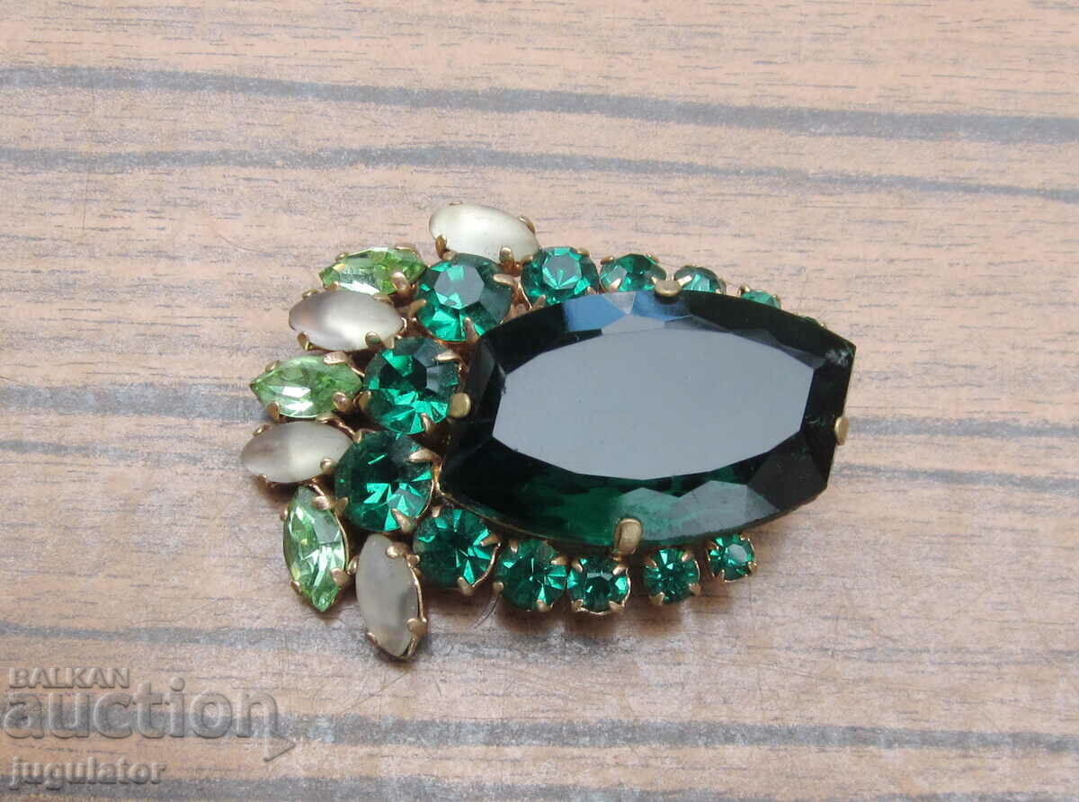 original old lady's jewel brooch with green stones