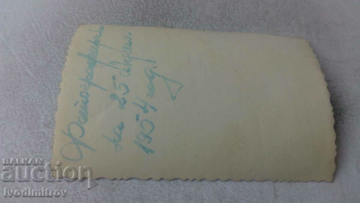 Photo A soldier and a young woman hugging a white bunny, 1954 with price 1.65 BGN | € 0.84 Photo A soldier and a young woman hugging a white bunny, 1954 with price 1.65 BGN | € 0.84