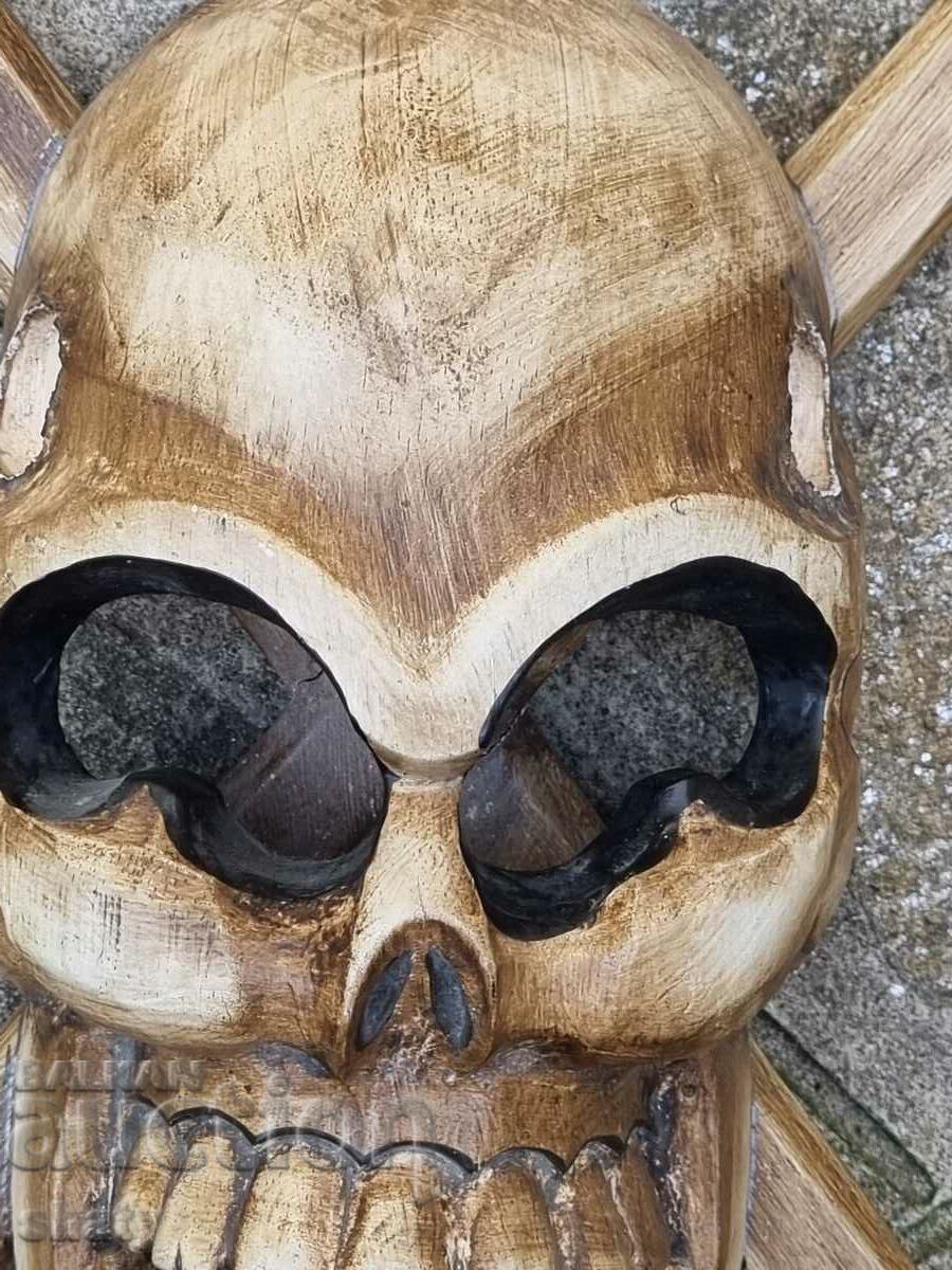 Auction Wooden skull with bones. Pirate crest Auction Wooden skull with bones. Pirate crest