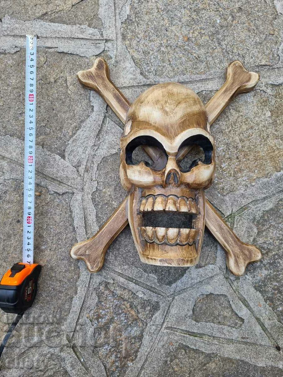 Wooden skull with bones. Pirate crest