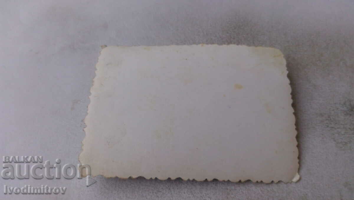 Photo A young man and a girl on a wooden bench with price 1.35 BGN | € 0.69 Photo A young man and a girl on a wooden bench with price 1.35 BGN | € 0.69