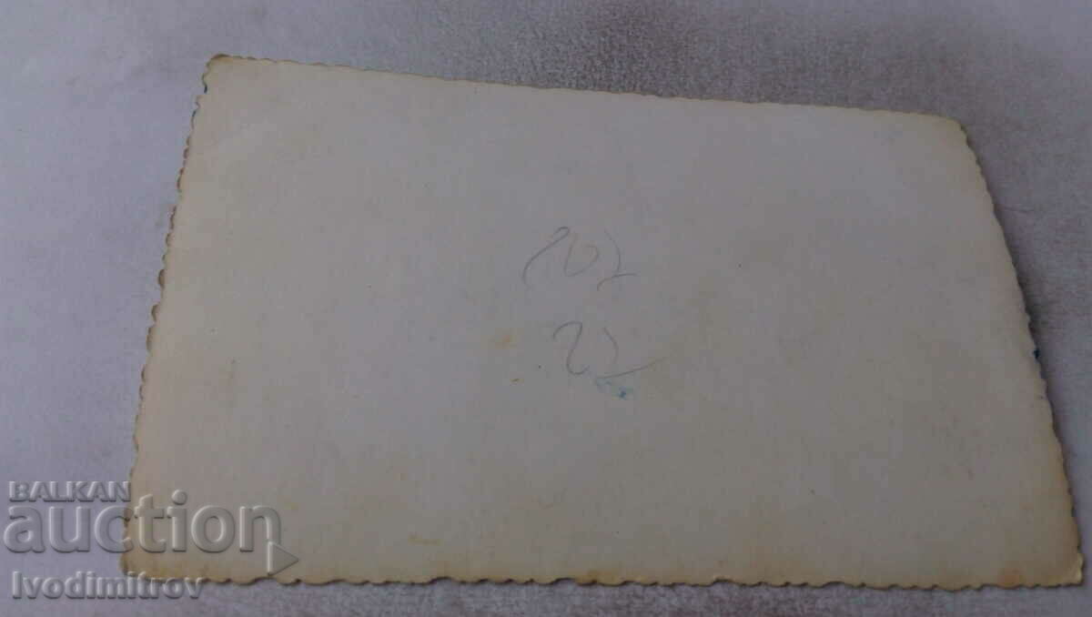 Photo of newlyweds with their friends with price 1.35 BGN | € 0.69