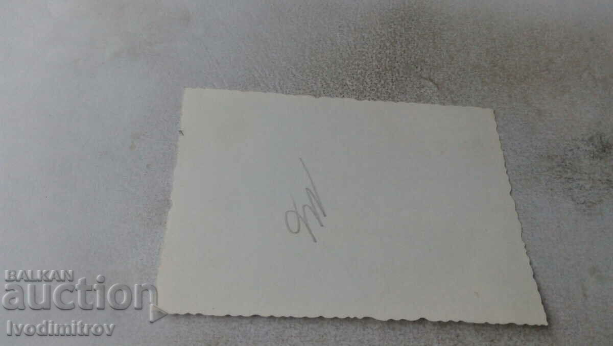 Photo Sofia A young woman next to a car Moskvich with price 2.35 BGN | € 1.20 Photo Sofia A young woman next to a car Moskvich with price 2.35 BGN | € 1.20