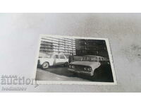 Photo Sofia A young woman next to a car Moskvich