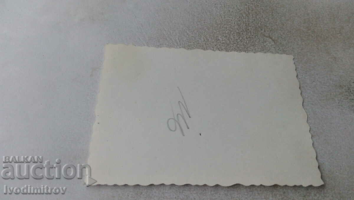 Photo Sofia A young woman in front of a Zhiguli car with price 2.35 BGN | € 1.20 Photo Sofia A young woman in front of a Zhiguli car with price 2.35 BGN | € 1.20