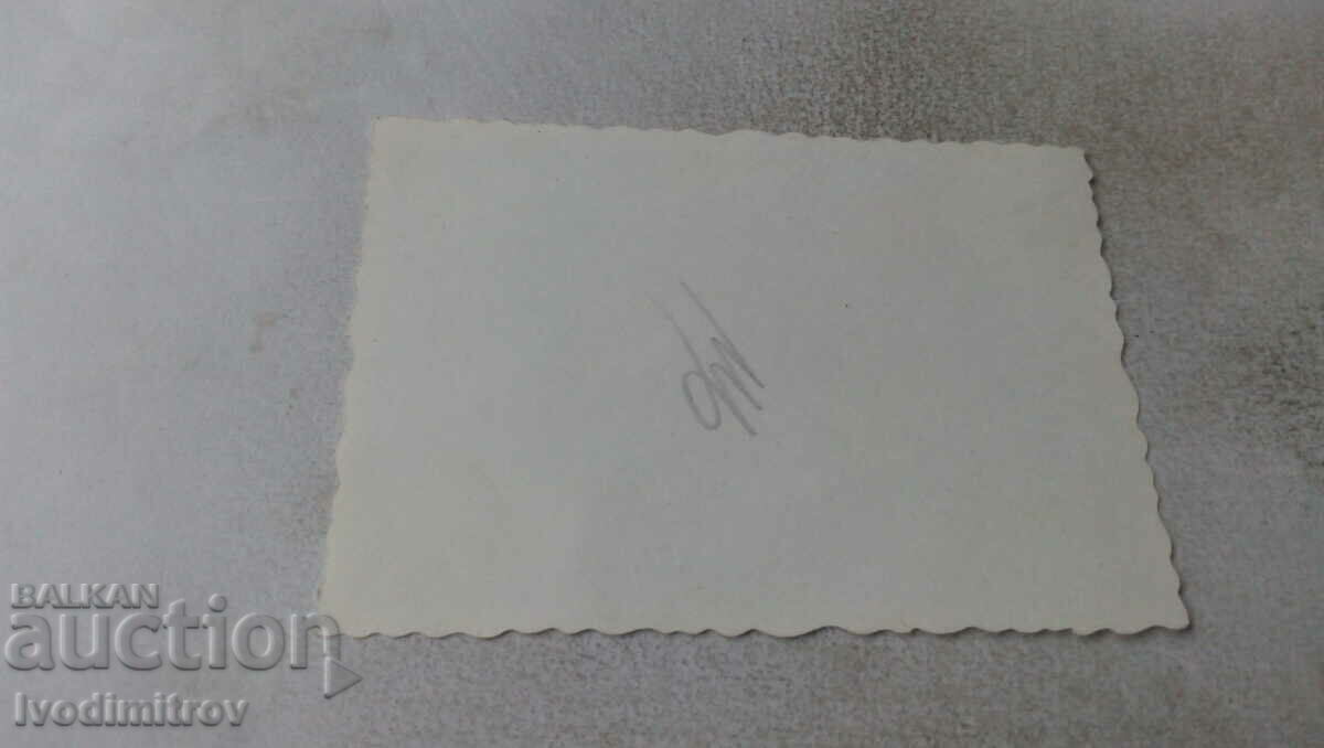 Photo Sofia A young woman on a bench in front of the block with price 2.35 BGN | € 1.20 Photo Sofia A young woman on a bench in front of the block with price 2.35 BGN | € 1.20