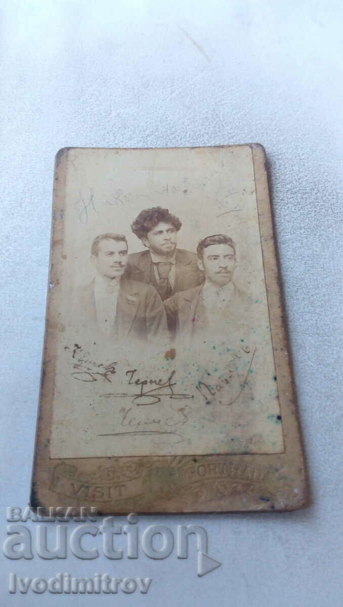 Photo Three young men Cardboard
