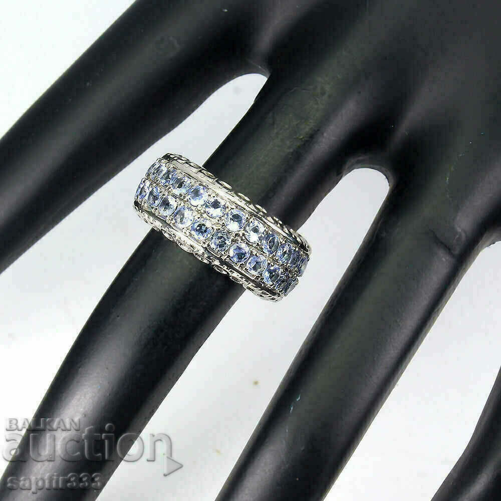 Auction  DESIGNER CHICOSE RING WITH NATURAL TANZANITE