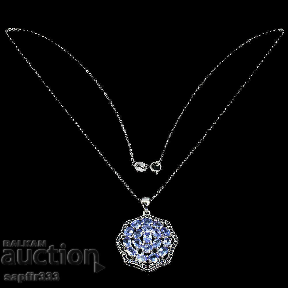 Auction DESIGNER MEDALLION TANZANITES AND SAPPHIRES "OCTAGON" Auction DESIGNER MEDALLION TANZANITES AND SAPPHIRES "OCTAGON"