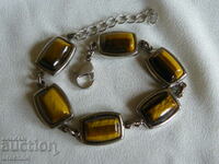 Solid silver bracelet with tiger's eye