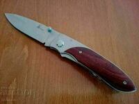 Pocket knife with wooden handles