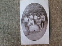 PHOTO FROM THE FRONT WITH A GROUP OF SANITARY