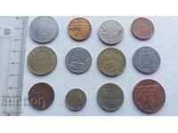 A COLLECTION OF 12 DIFFERENT COINS FROM AROUND THE WORLD