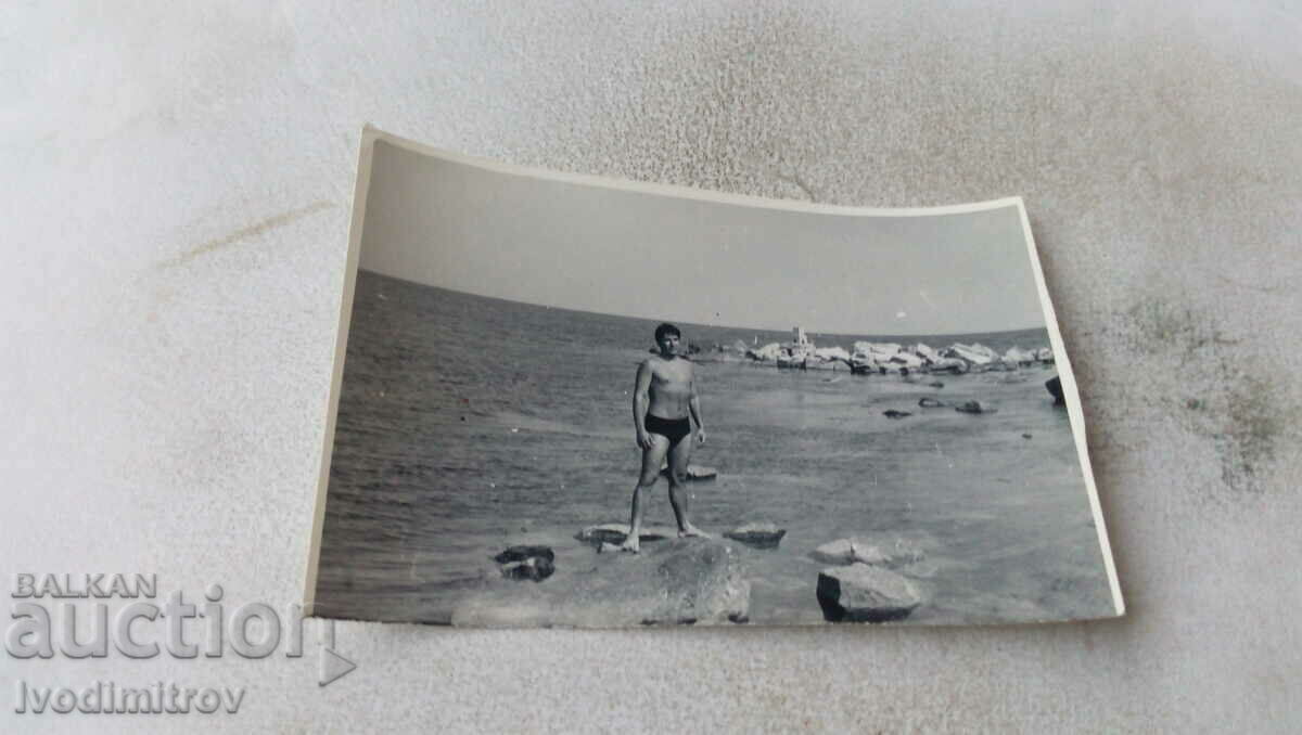 Снимка Несебър Мъж на камък покрай морето 1968