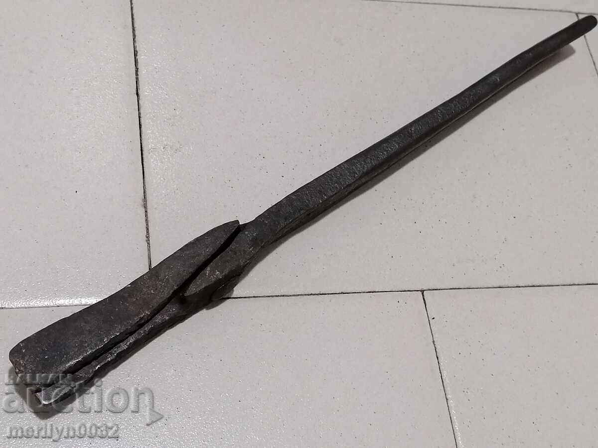 Auction  Blacksmith's tongs tool wrought iron