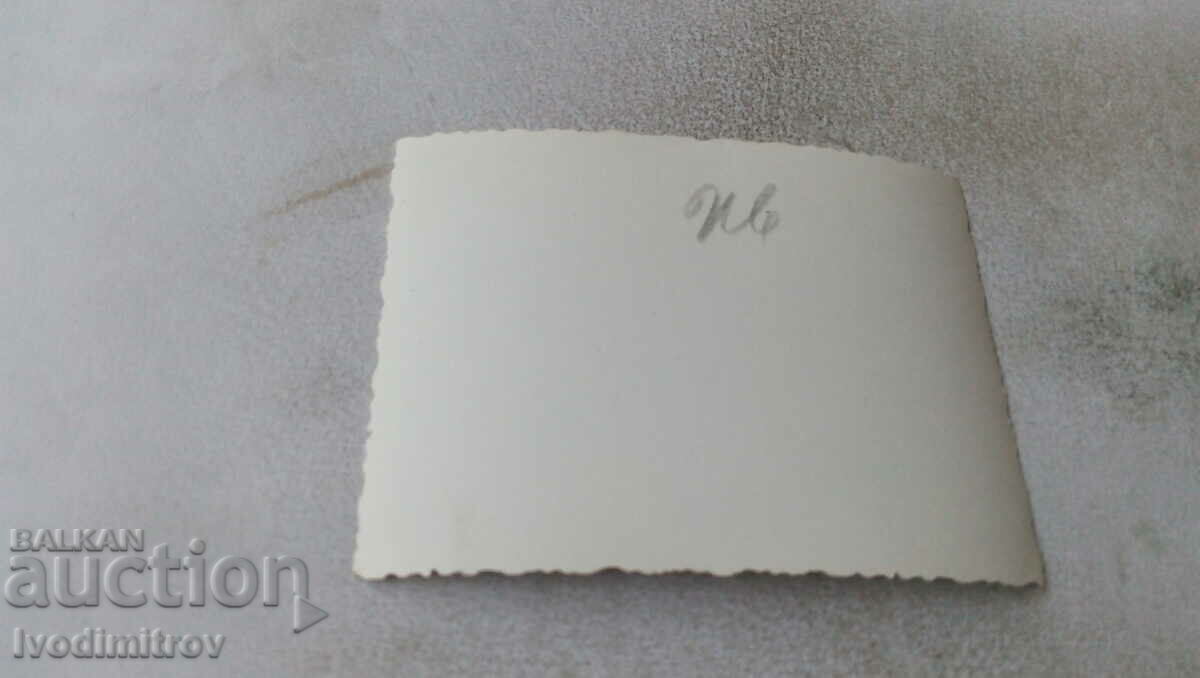 Photo Man with a retro motorcycle with price 1.75 BGN | € 0.89 Photo Man with a retro motorcycle with price 1.75 BGN | € 0.89