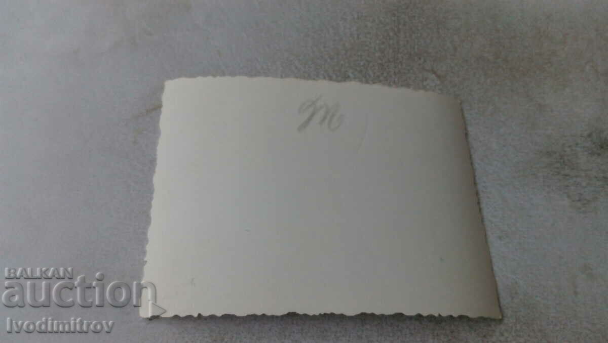 Photo Man with a retro motorcycle with price 1.75 BGN | € 0.89 Photo Man with a retro motorcycle with price 1.75 BGN | € 0.89