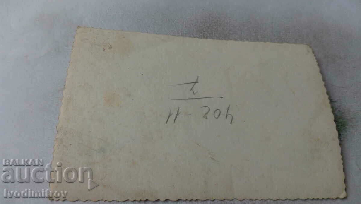 Photo Men and women in front of an office building with price 1.35 BGN | € 0.69