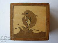 Old, small, wooden, interesting jewelry box.