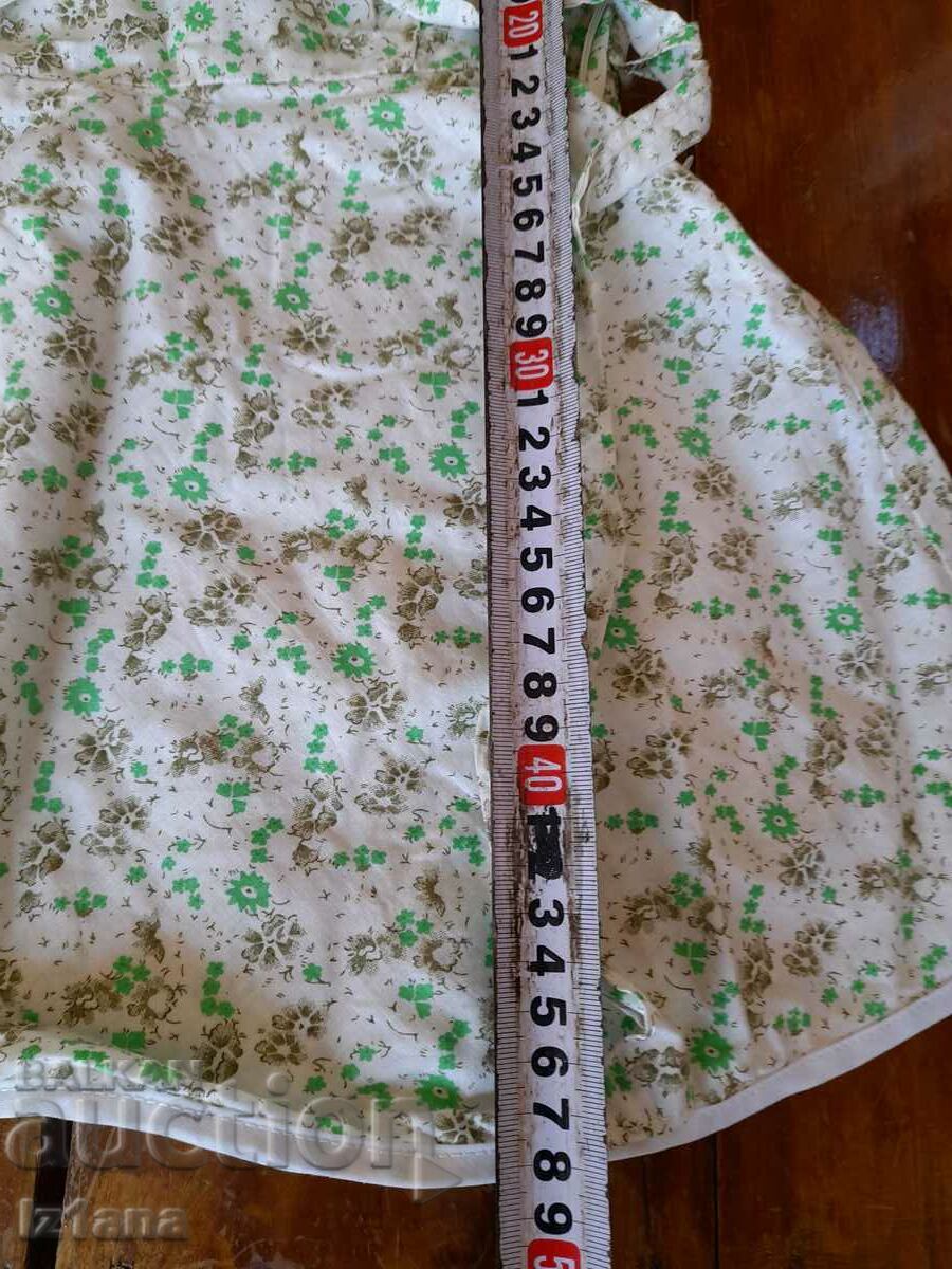 Delivery of An old children's dress Delivery of An old children's dress