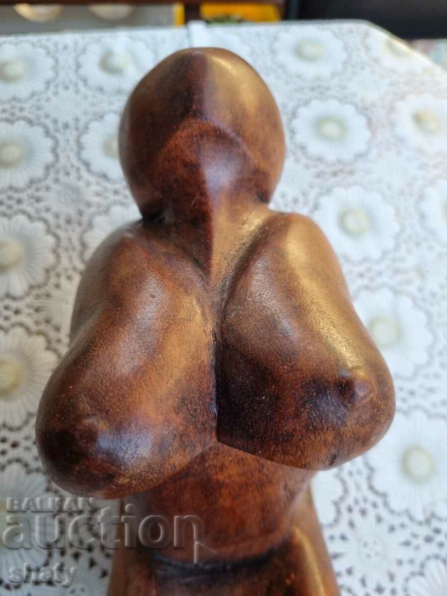 A wooden statue. Wooden figure - 5 A wooden statue. Wooden figure - 5