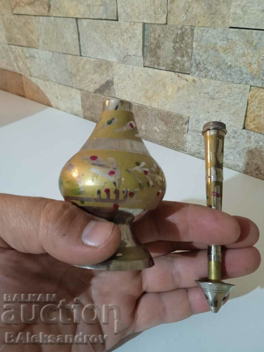Delivery of Old bronze bottle for essential oils