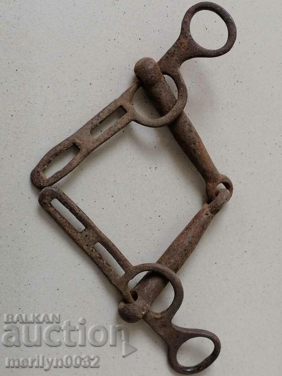 Delivery of An old forged bridle reins wrought iron, a harness