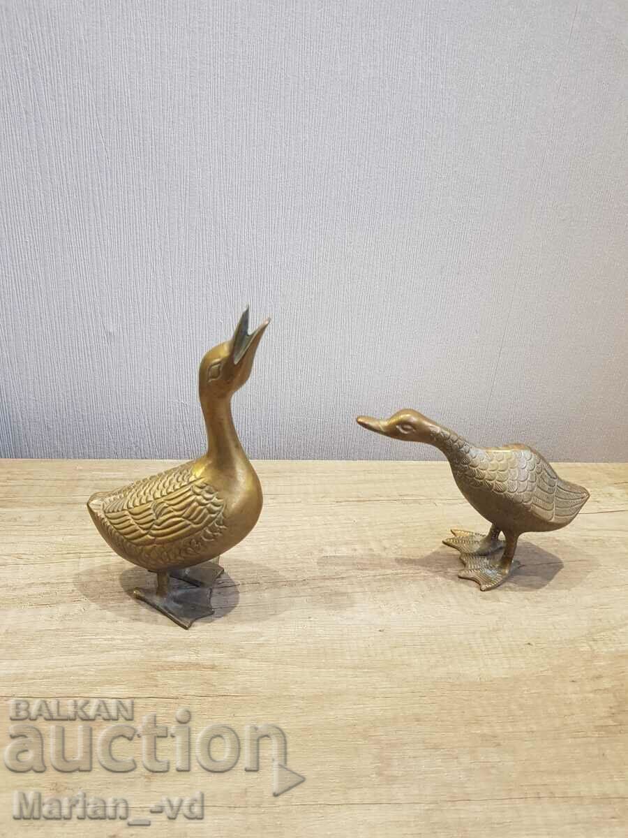 Two bronze ducks