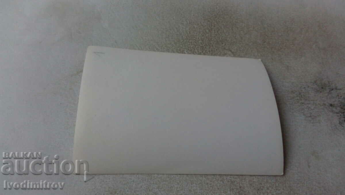 Photo Two young women on a stone on the seashore with price 1.15 BGN | € 0.59