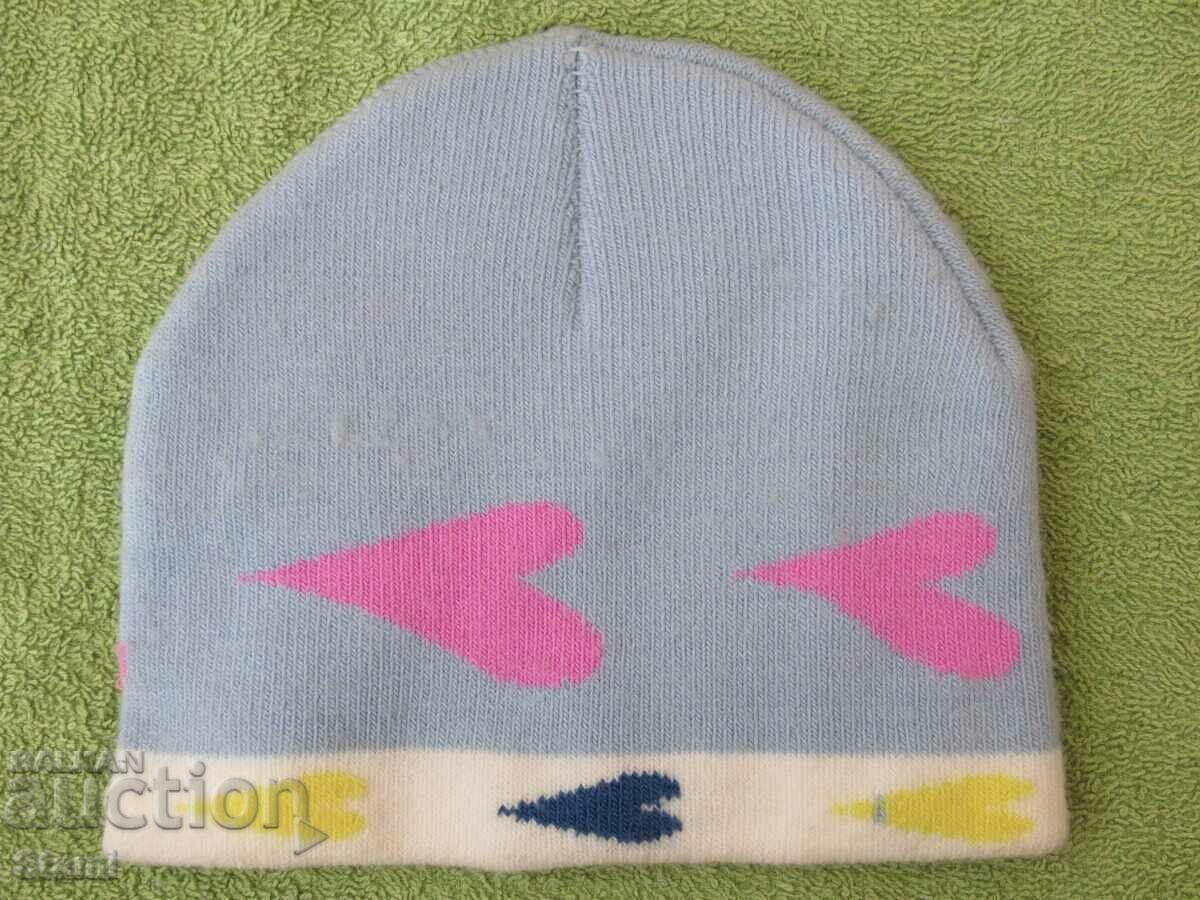 Delivery of Children's knitted hat in milky blue color, new Delivery of Children's knitted hat in milky blue color, new