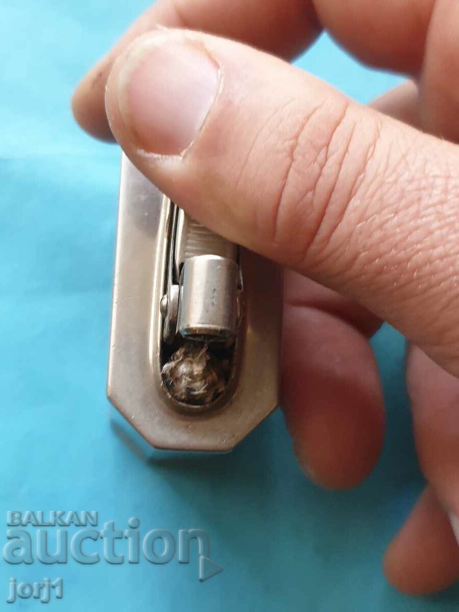 Auction old metal lighter Auction old metal lighter