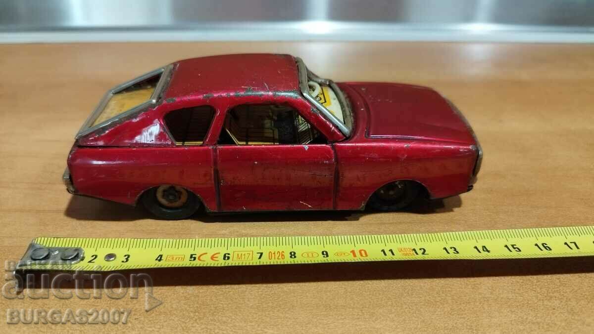 Old tin toy car