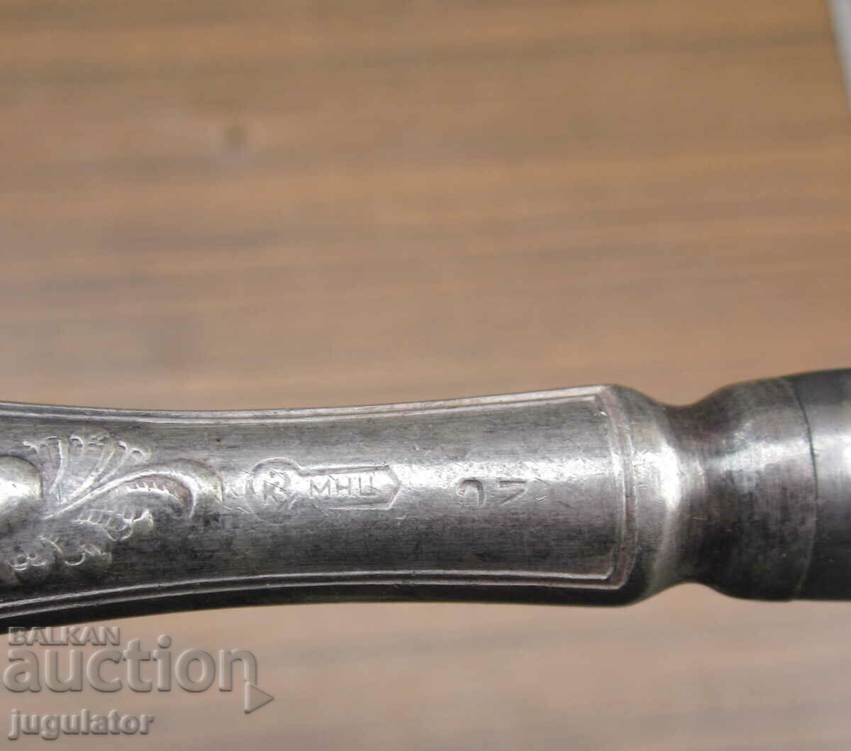 Delivery of old Russian silver plated butter knife with ornaments Delivery of old Russian silver plated butter knife with ornaments