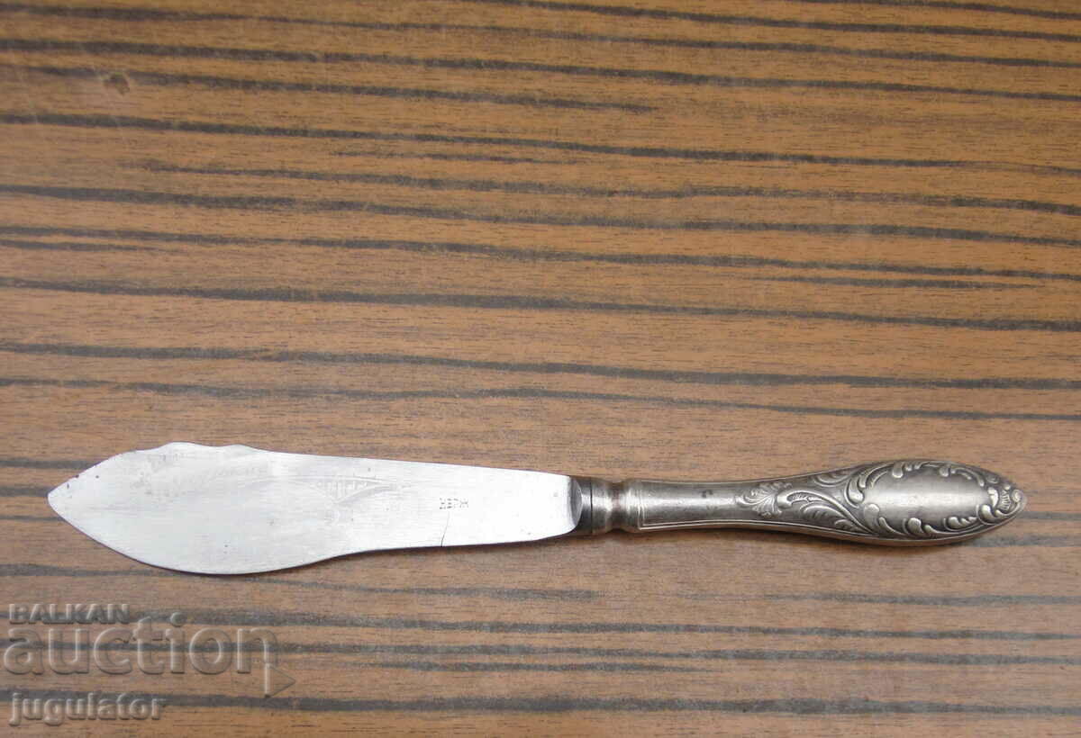 old Russian silver plated butter knife with ornaments