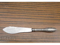 old Russian silver plated butter knife with ornaments