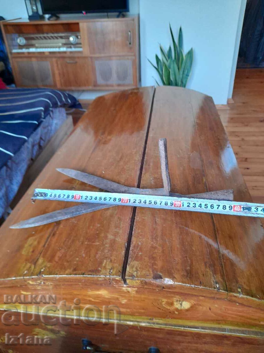 Delivery of An old tool for cutting hay