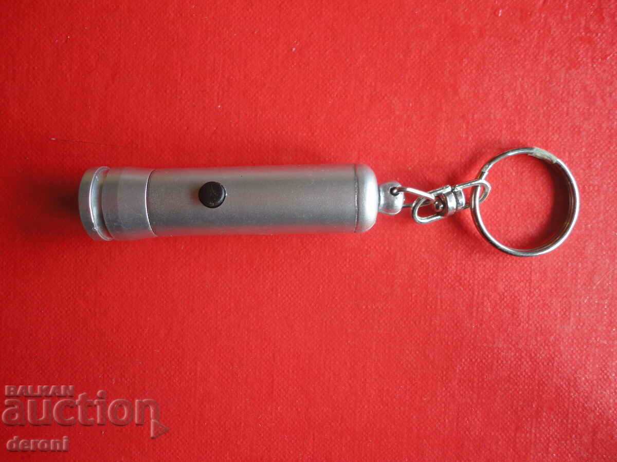 Φακός Μπρελόκ με τιμή 5.00 BGN | € 2.56 Φακός Μπρελόκ με τιμή 5.00 BGN | € 2.56