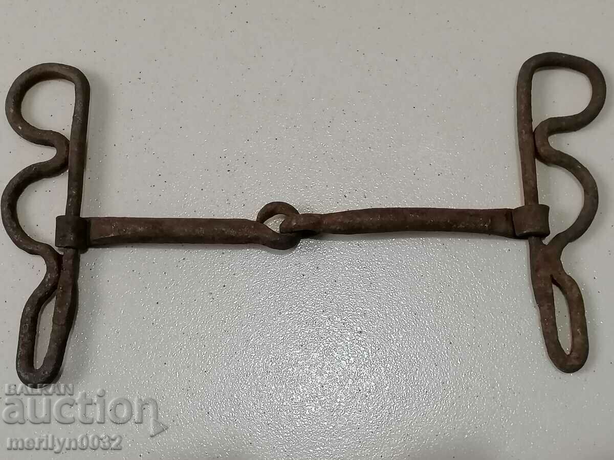 Auction An old forged bridle reins wrought iron, a harness Auction An old forged bridle reins wrought iron, a harness
