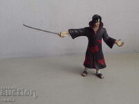 Figure: Sasuke from the Naruto anime series.