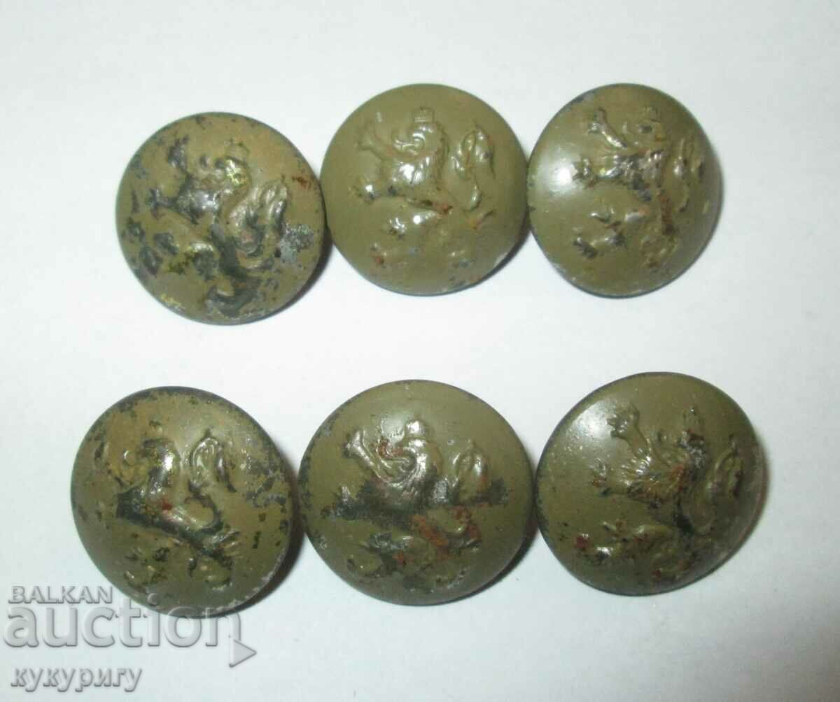 Old Royal metal buttons from a military uniform