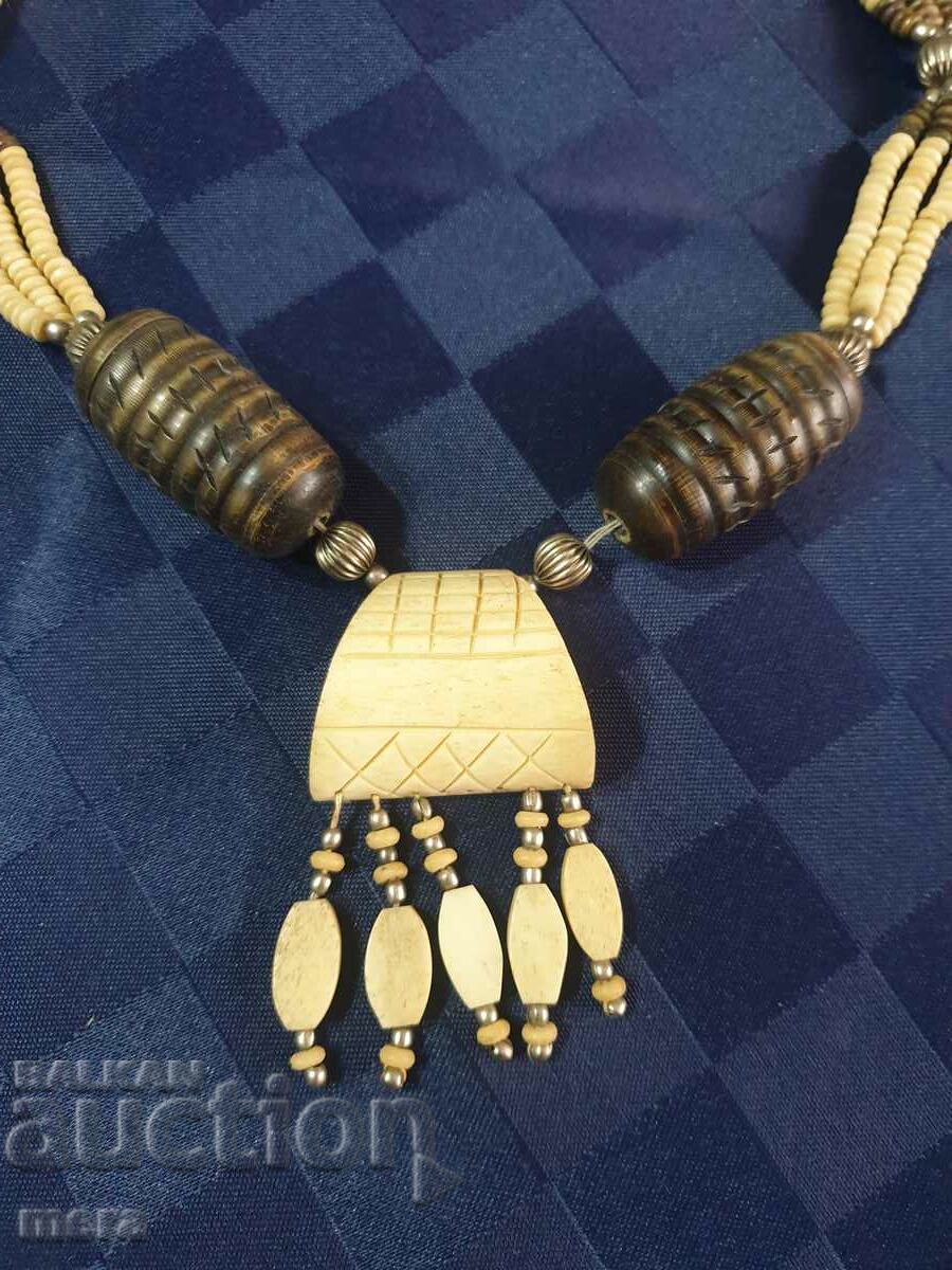 Ivory and exotic wood necklace with price 45.00 BGN | € 23.01 Ivory and exotic wood necklace with price 45.00 BGN | € 23.01