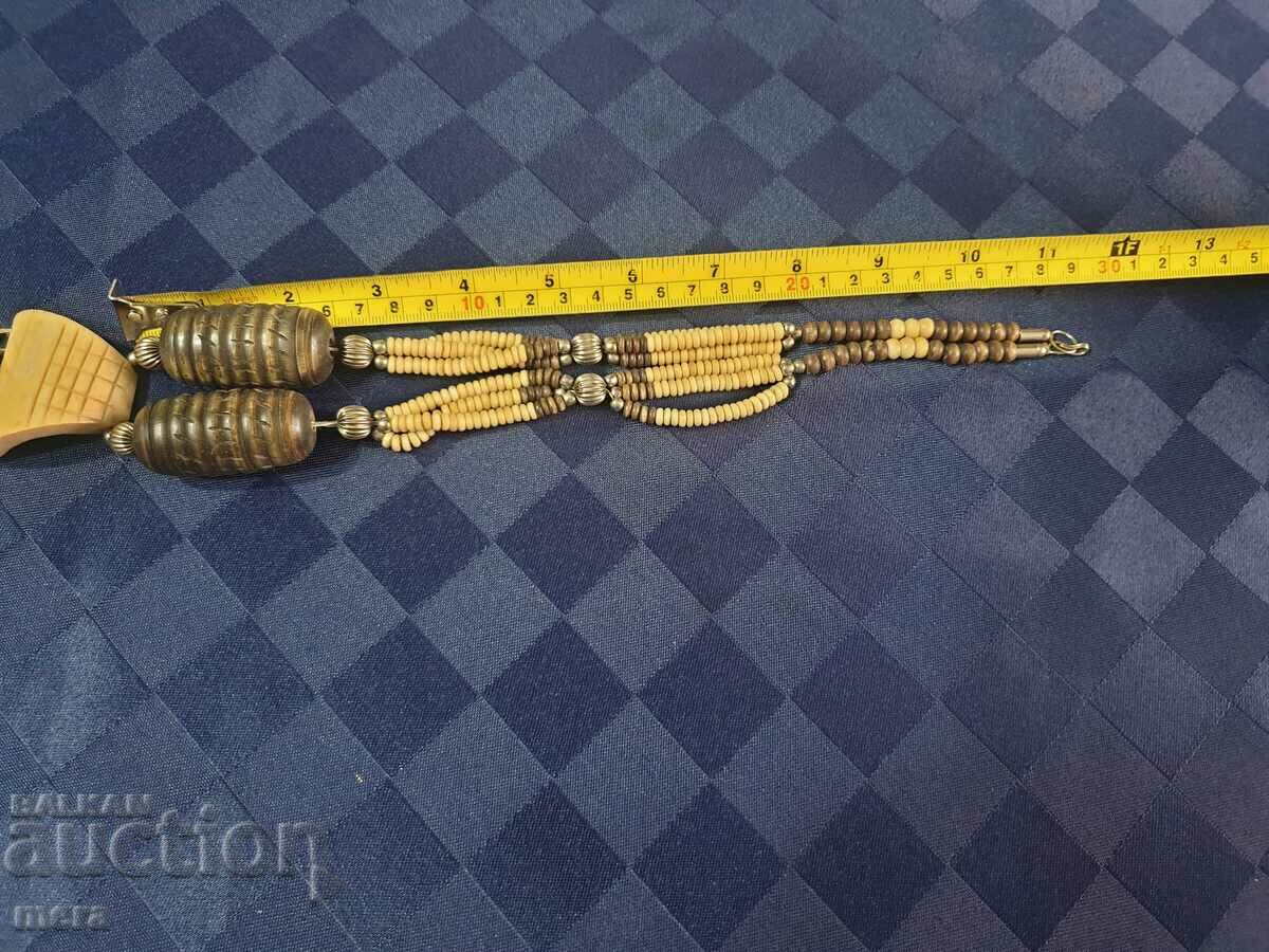 Auction Ivory and exotic wood necklace Auction Ivory and exotic wood necklace