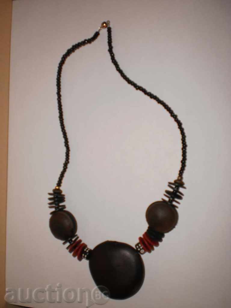 Necklace with exotic African seeds in grunge style