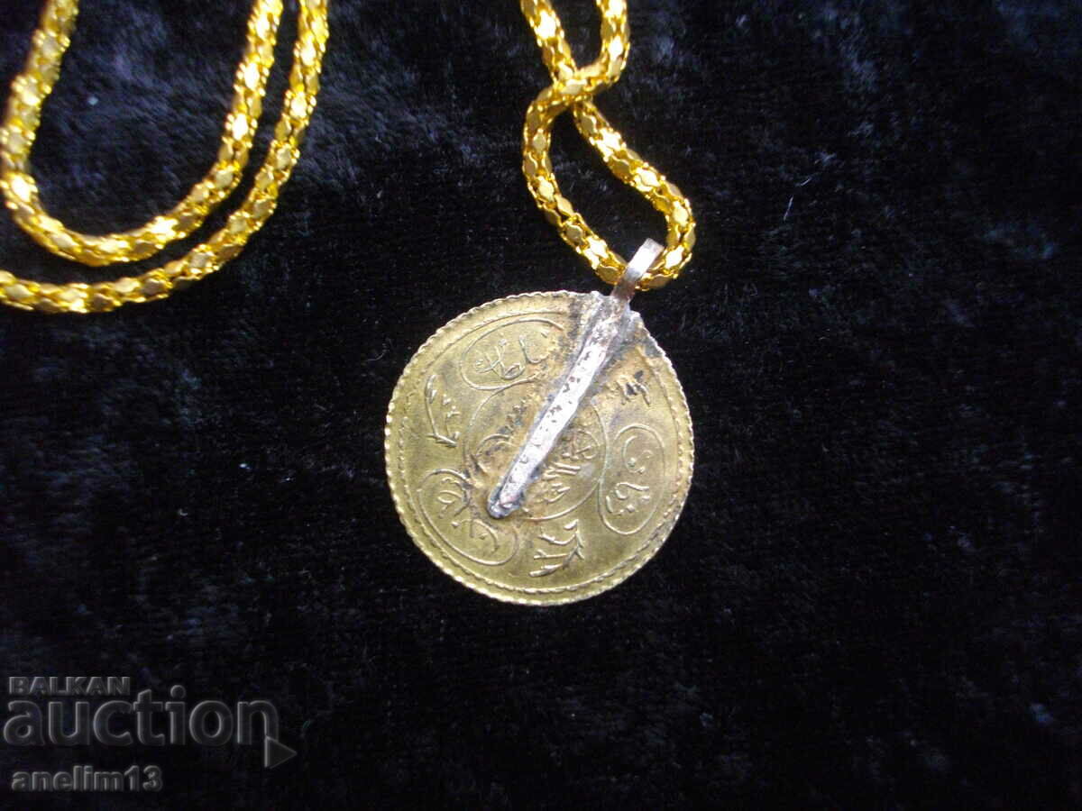 Auction  AN OLD GOLD PLATED JEWELRY HOLDER