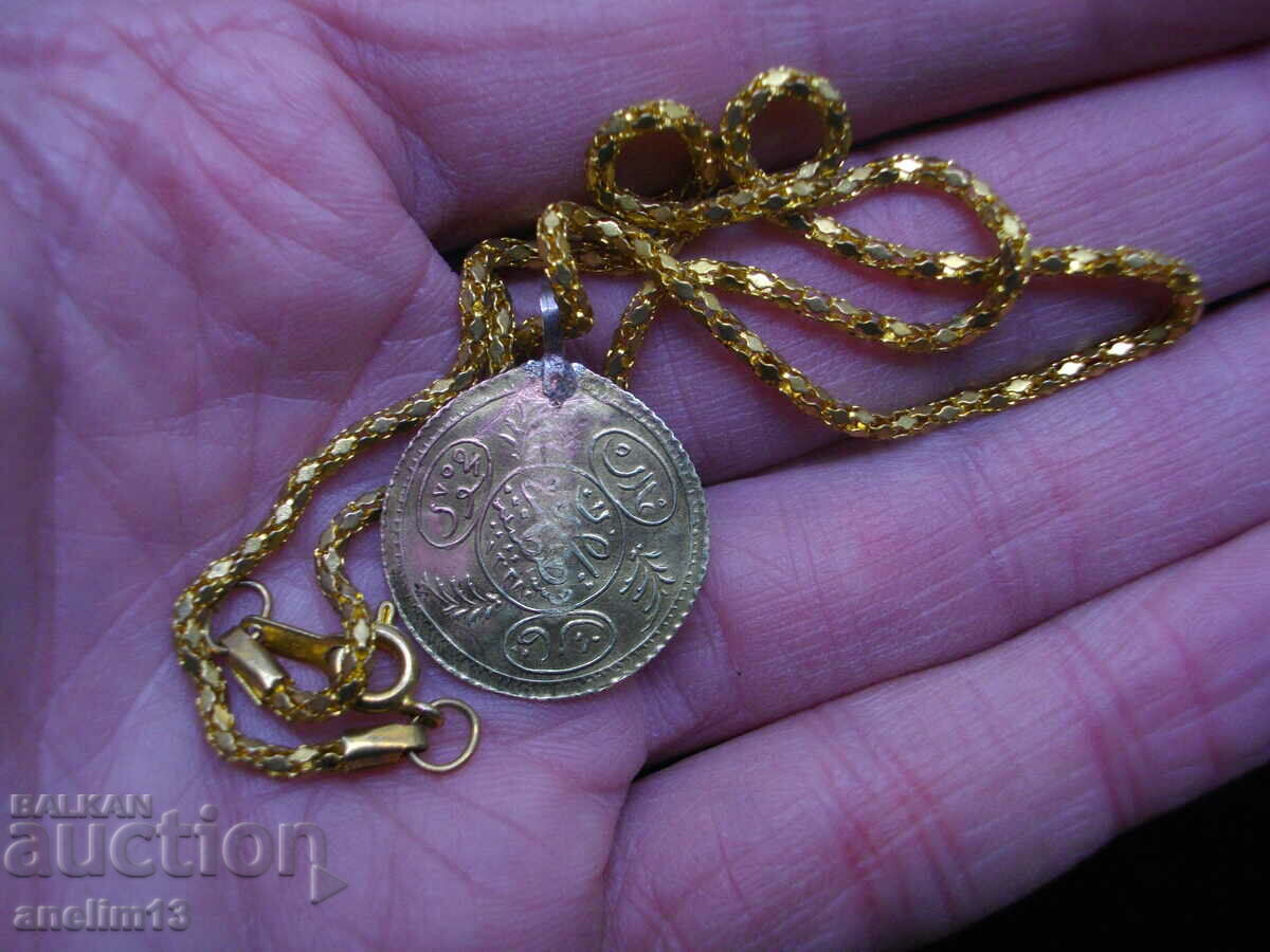 Delivery of AN OLD GOLD PLATED JEWELRY HOLDER