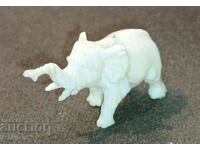 Hand carved miniature ivory elephant.
