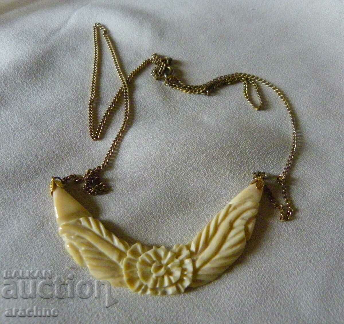 Ivory, silver and gold plated necklace