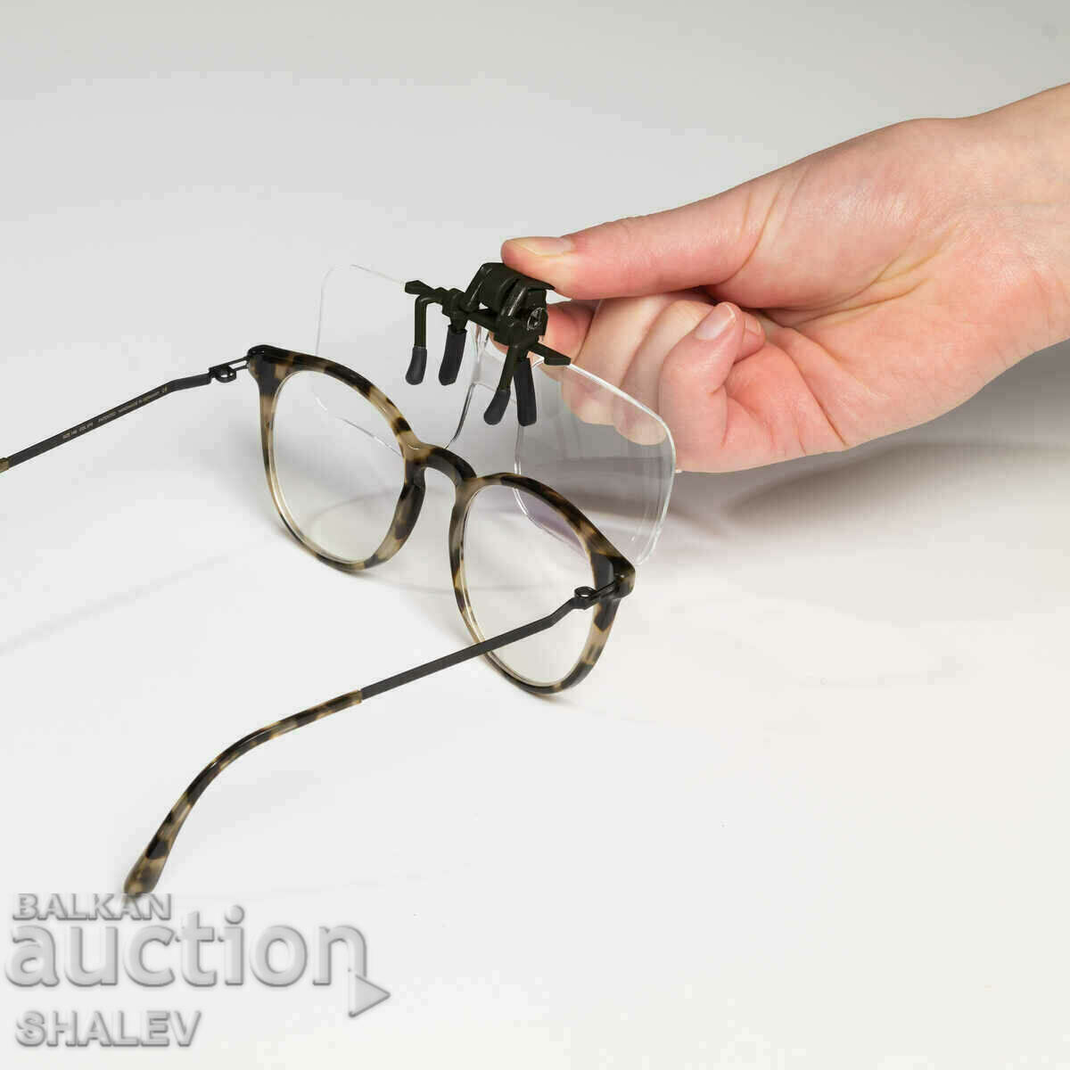 Auction  Magnifying glasses "Clip" 2x - Leuchtturm, Germany / 995.