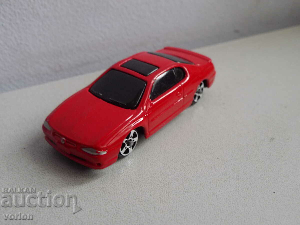 Cărucior: Chevrolet Monte Carlo SS 2000 - Maisto.