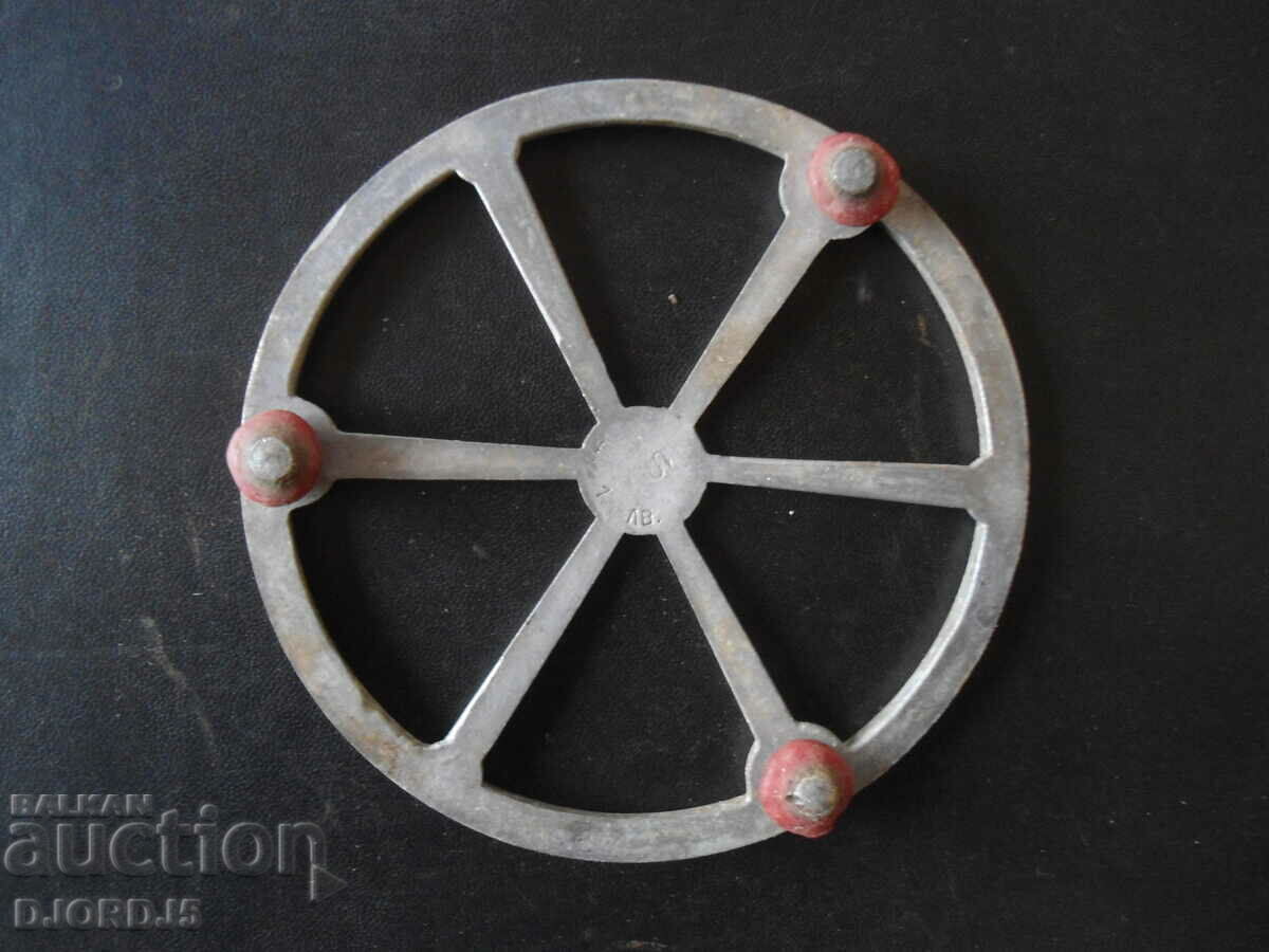 An old metal stand with price 3.00 BGN | € 1.53